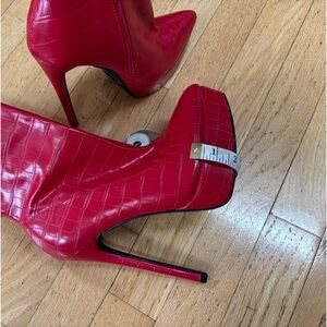 Faux leather red booties. 6.5
